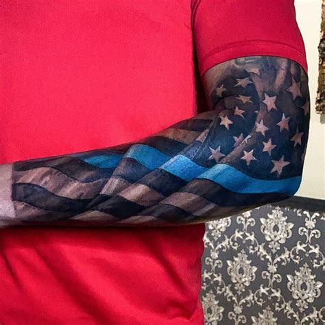 Roses represent many things in Christianity, including purity, joy, and martyrdom. . Patriotic arm sleeve tattoos